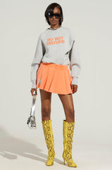 DO NOT DISTURB KNIT PLEATED MINI SKIRT