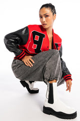 RIDER OF THE NIGHT OFF SHOULDER VARSITY BOMBER