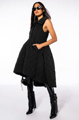 STEPPING OUT QUILTED PEPLUM VEST