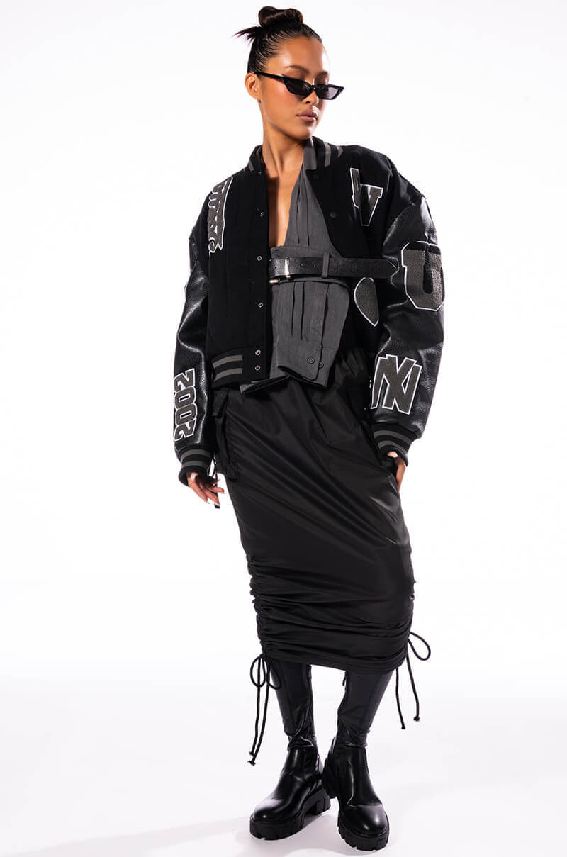 RUELA BLACK OUT OVERSIZED VARSITY BOMBER