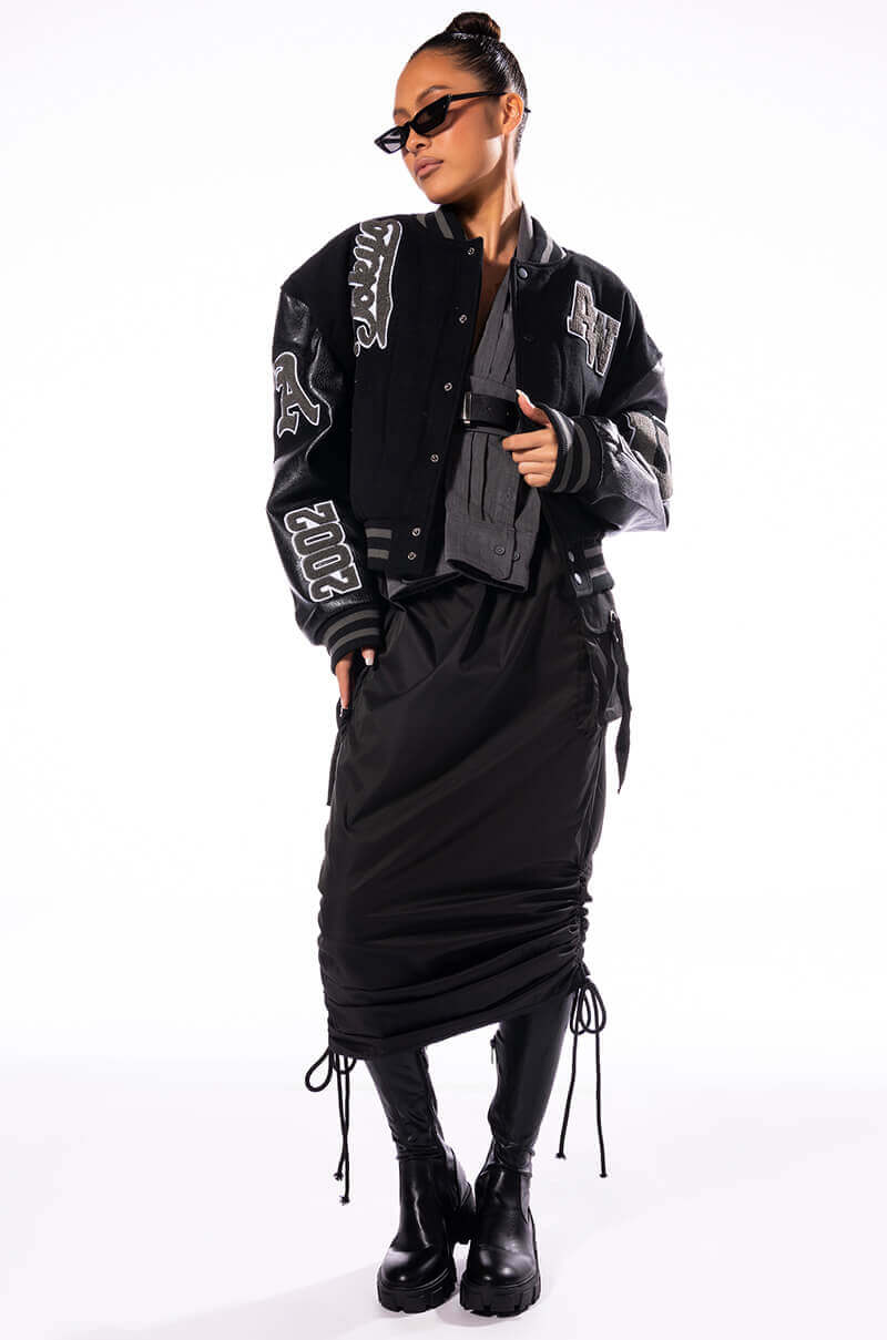 RUELA BLACK OUT OVERSIZED VARSITY BOMBER