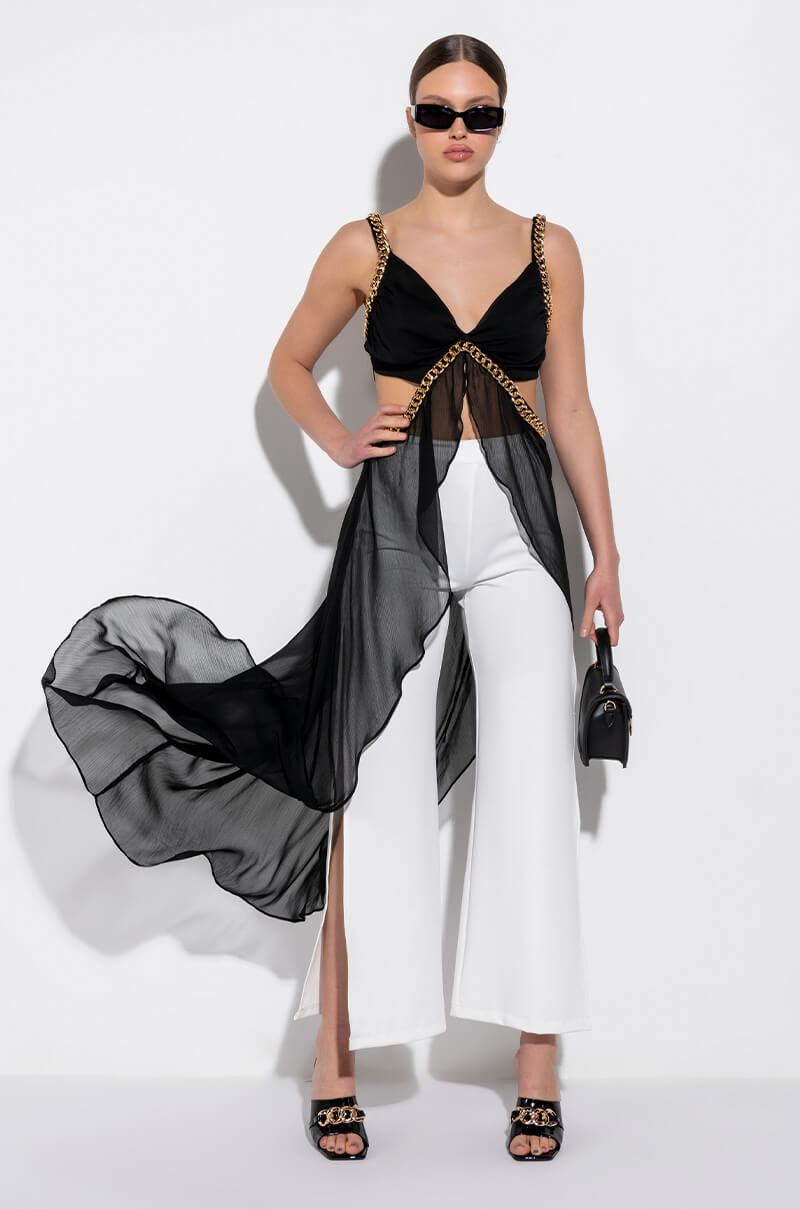 CAN'T BE CHAINED SLEEVELESS CHIFFON CUTOUT HIGH LOW BLOUSE