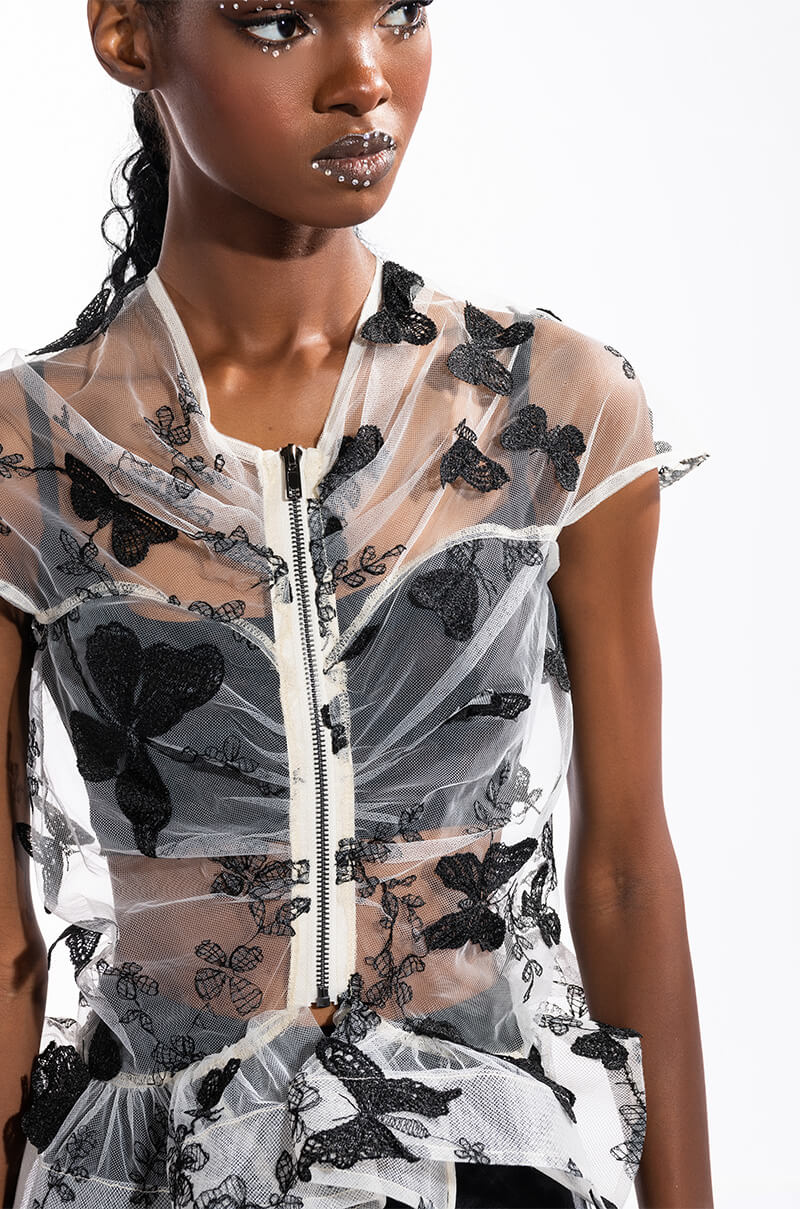 FLUTTERBY SHORT SLEEVE PEPLUM BLOUSE