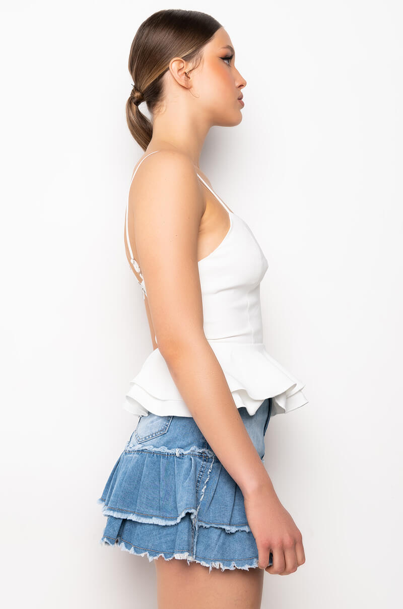 MAKE AN ENTRANCE CASCADING RUFFLE PEPLUM BLOUSE