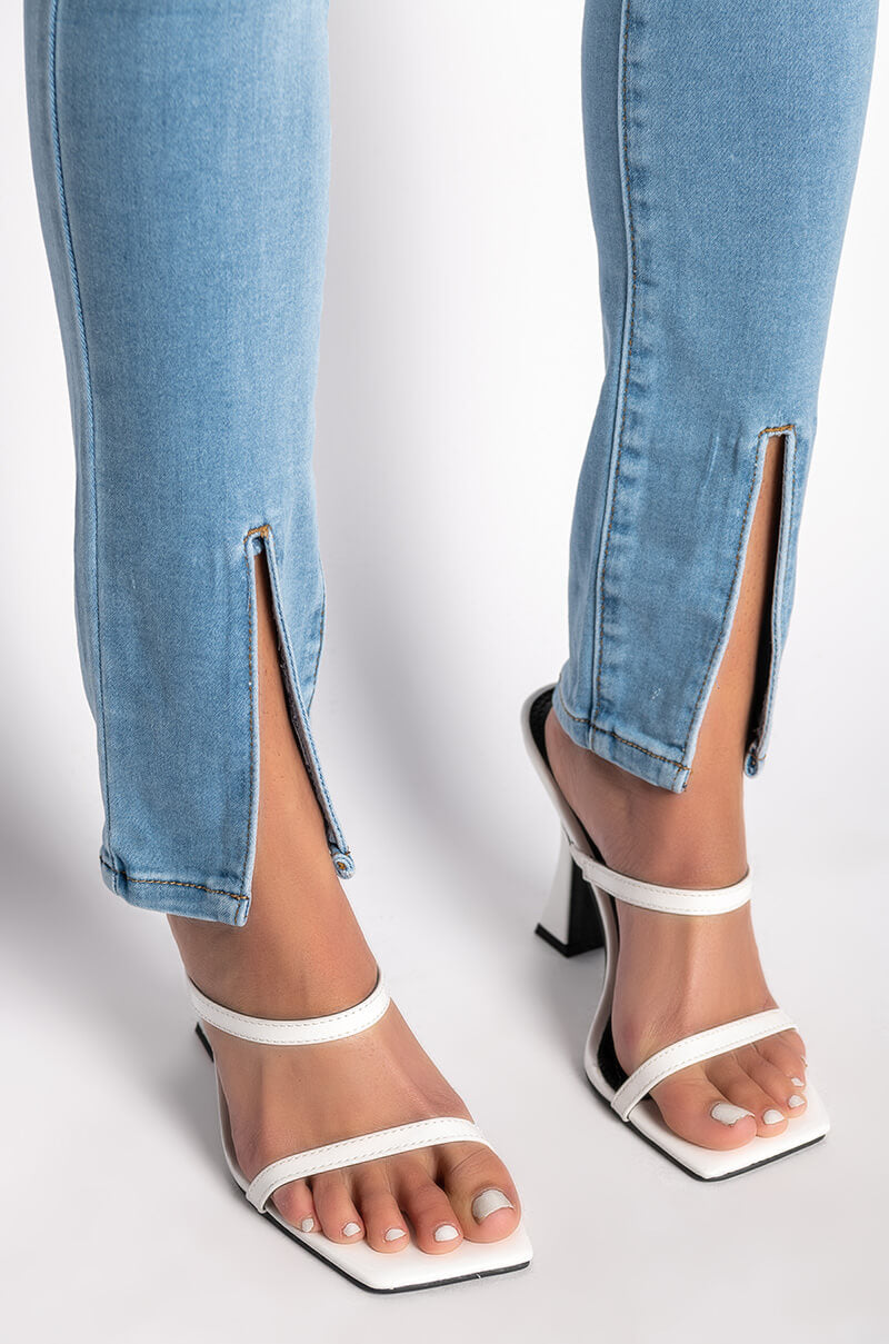NIGHTFALL MID RISE SKINNY JEANS WITH FRONT SLIT