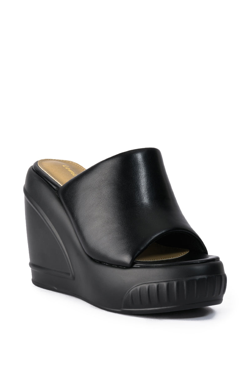 OCEAN EYES WEDGE SANDAL IN BLACK