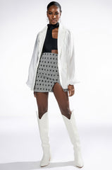 READ BETWEEN THE LINES HIGH RISE MINI SKIRT