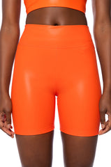 RIO FAUX LEATHER BIKER SHORT IN ORANGE