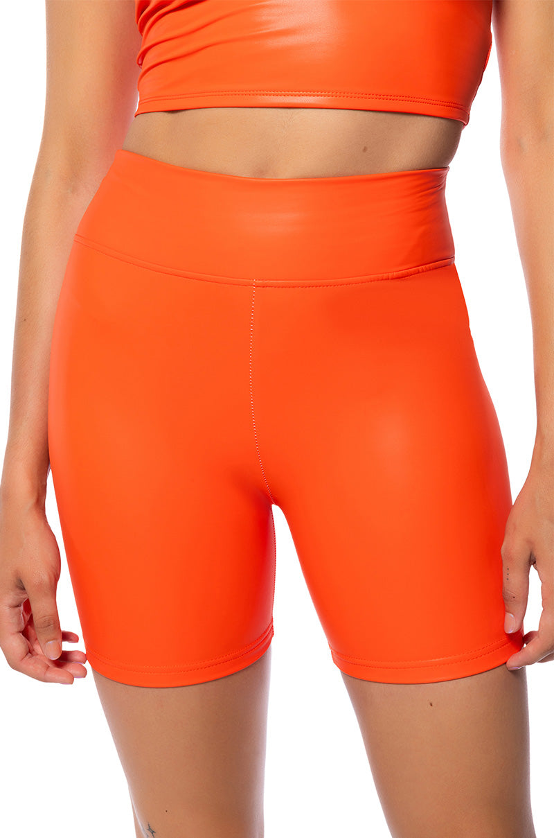 RIO FAUX LEATHER BIKER SHORT IN ORANGE