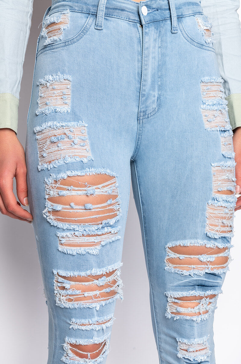 SHOW ME BABY DISTRESSED SKINNY JEANS