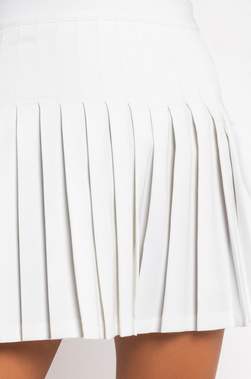 SWISS KISS PLEATED SKIRT