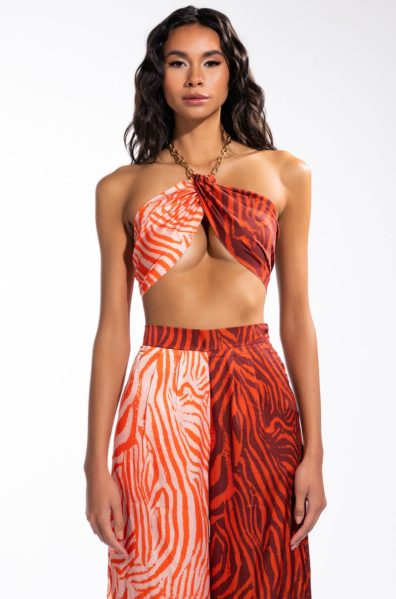 WALK IT LIKE I TALK IT HALTER TOP BRALETTE