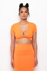 WORST BEHAVIOR KNOT FRONT CROP TOP
